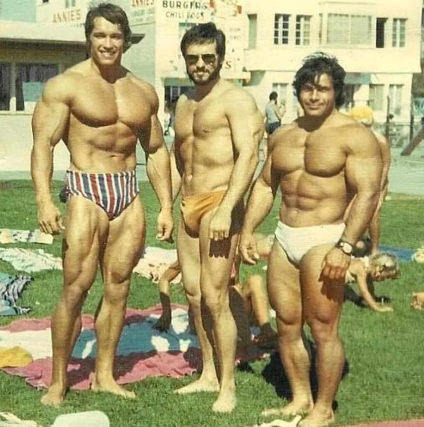 “Arnold Schwarzenegger and two training partners in Venice Beach - early 70s.”